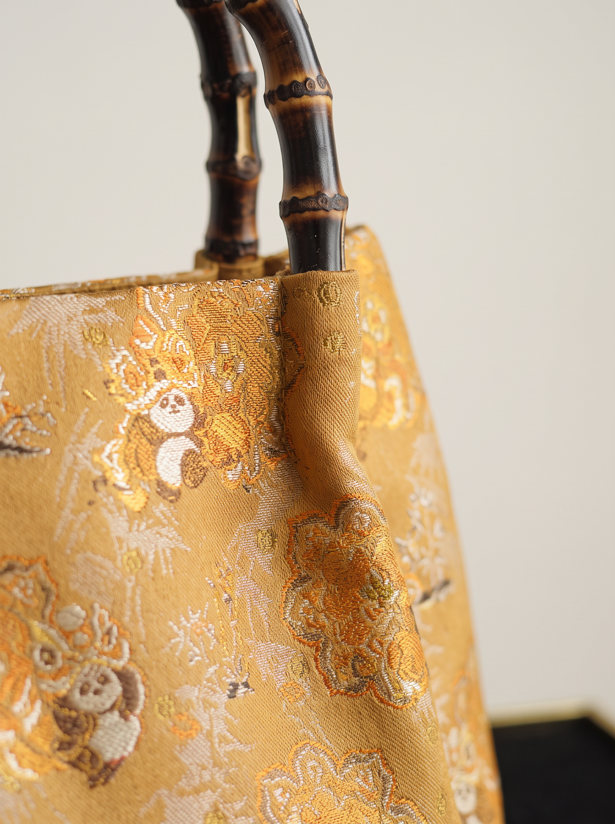 Silk Brocade Bamboo-Handle Bag — Panda & Lion-Dance Motif