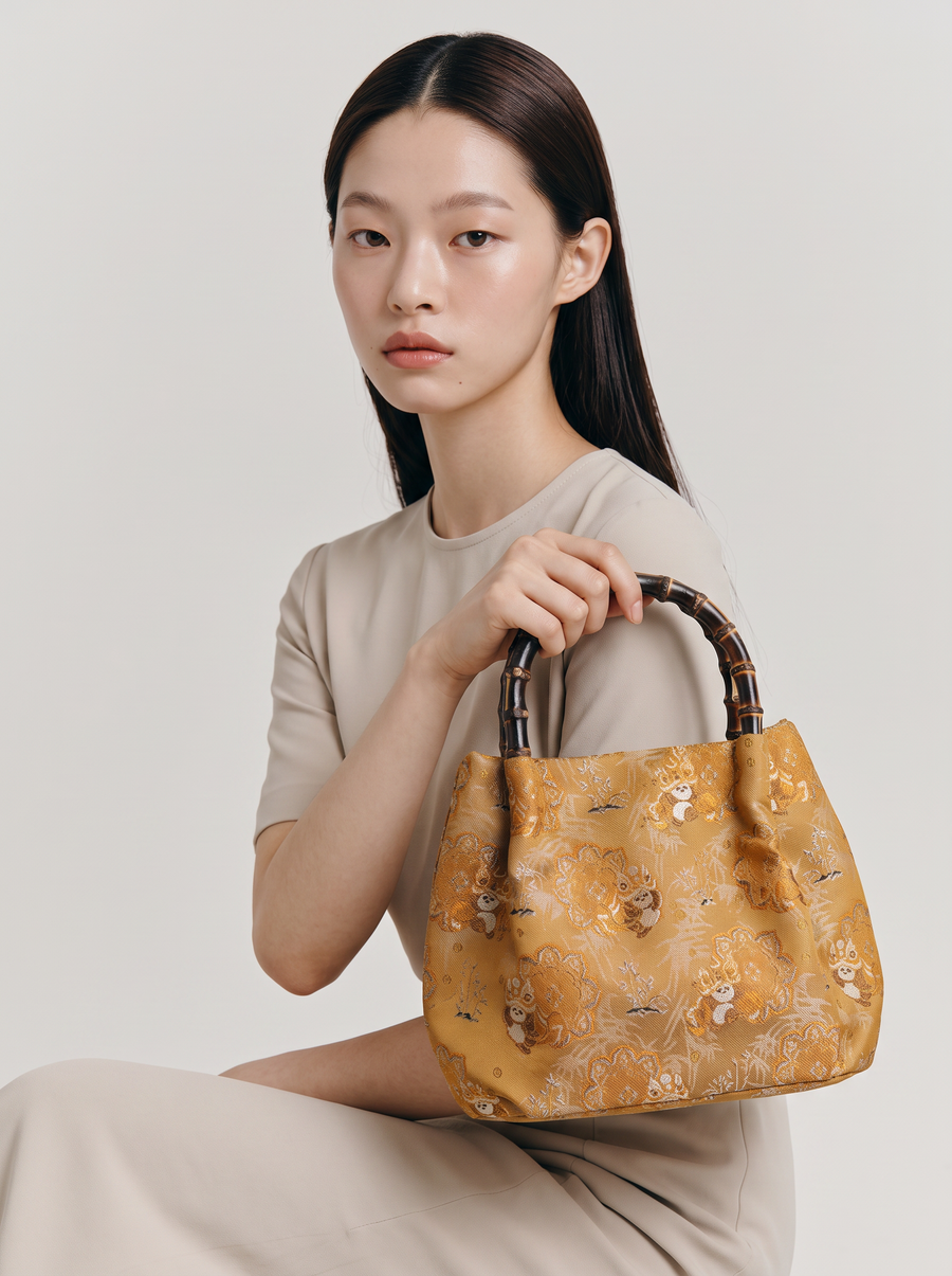 Silk Brocade Bamboo-Handle Bag — Panda & Lion-Dance Motif